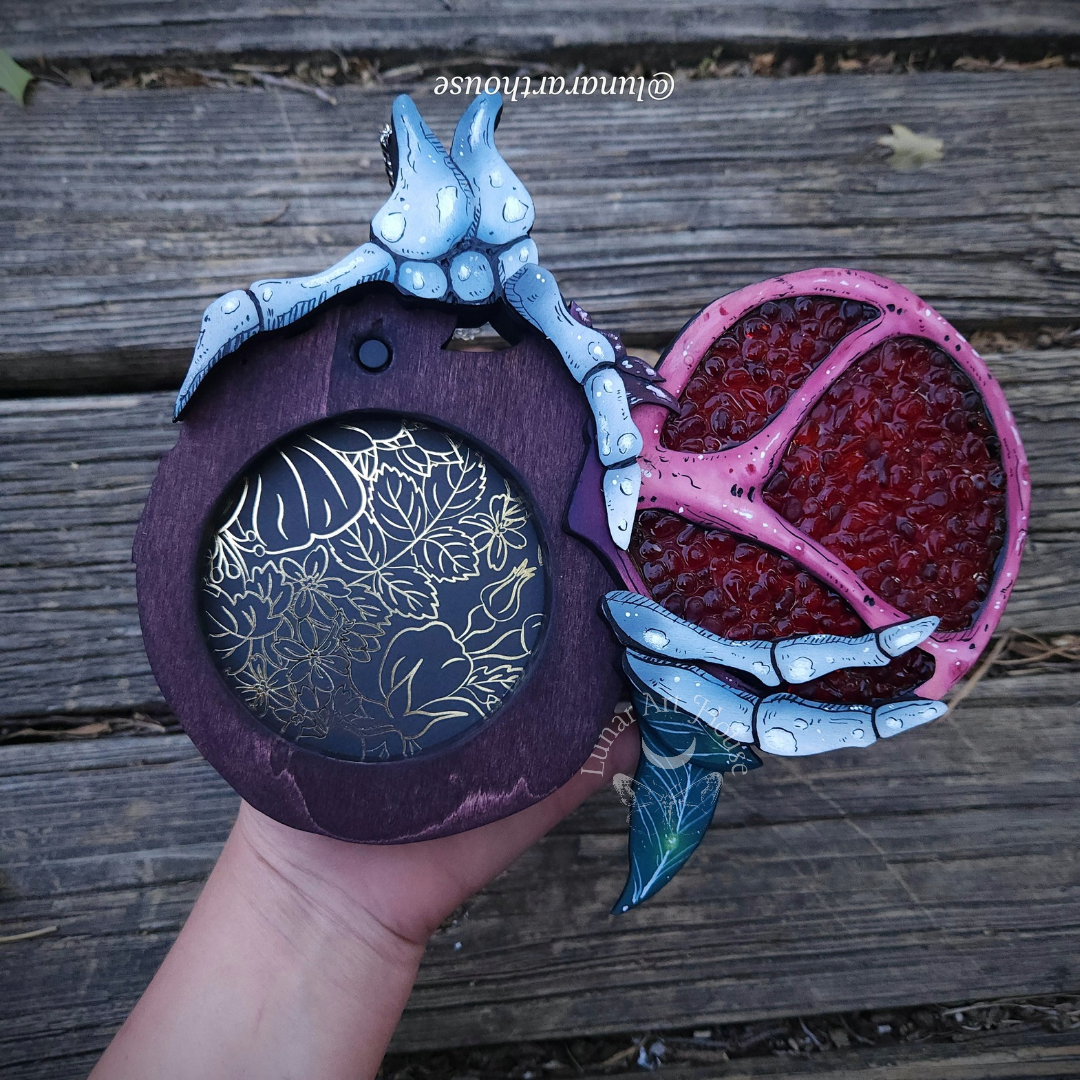 Pomegranate Skelly Hand secret compartment