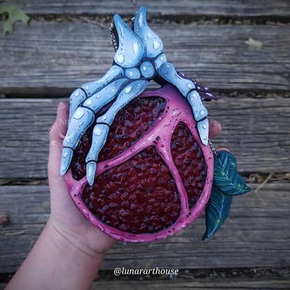 Pomegranate Skelly Hand secret compartment