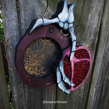 Pomegranate Skelly Hand secret compartment